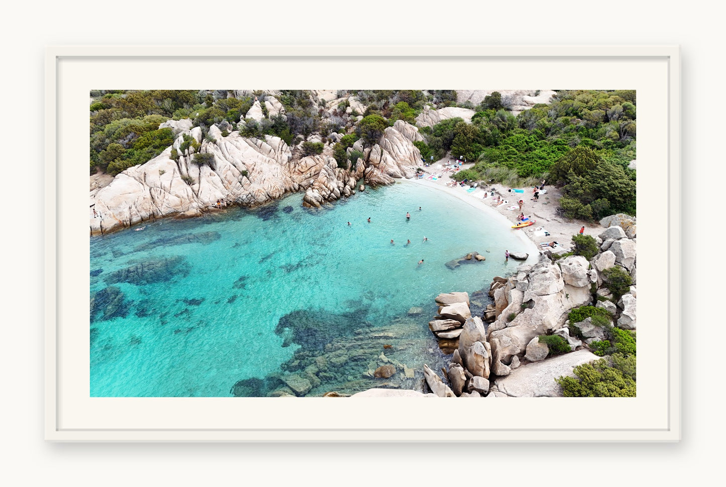 
                  
                    Hidden Beach, Sardinia, framed in white with a 5 cm white border, shown at 66 x 87 cm
                  
                