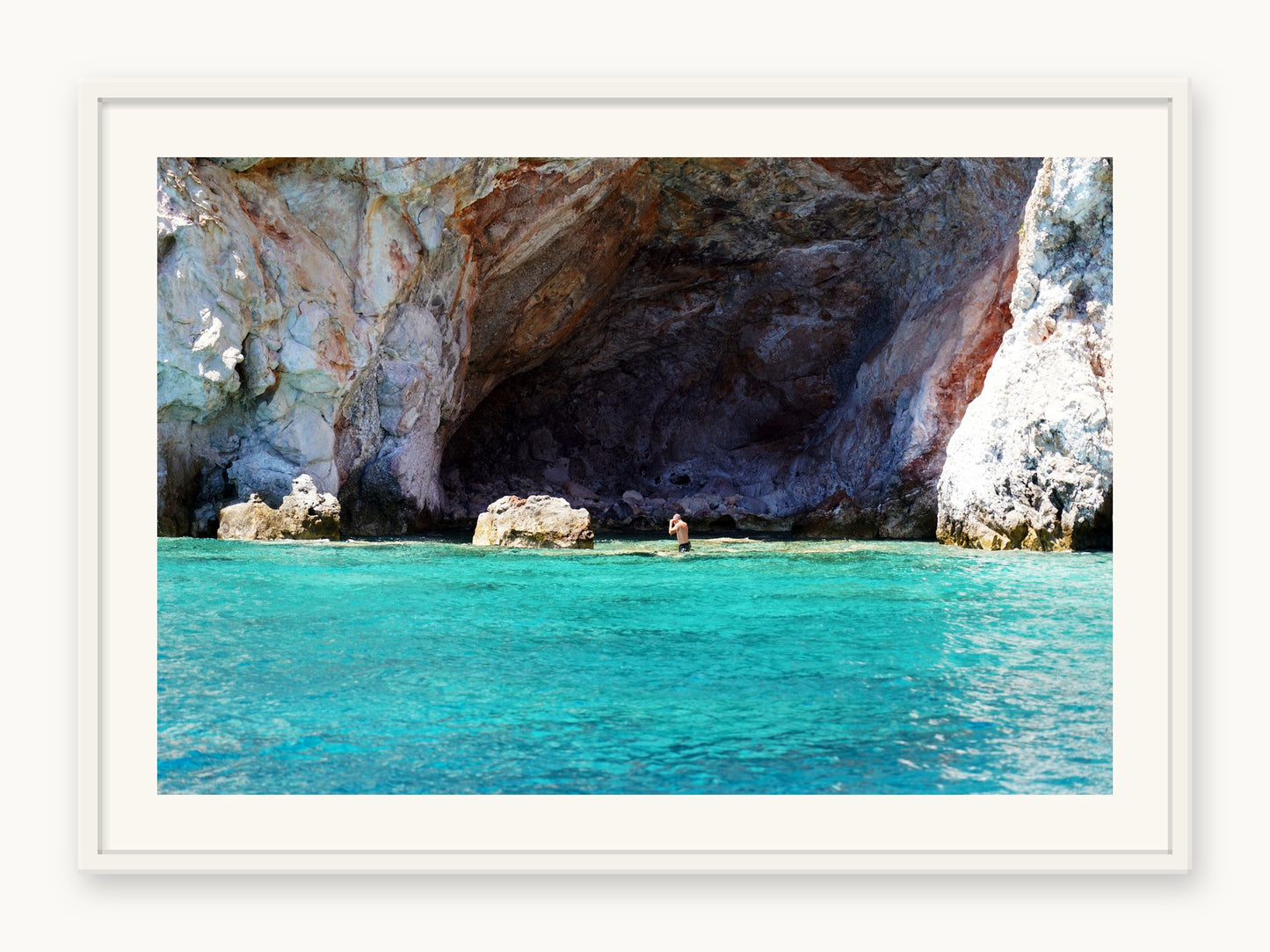 
                  
                    Kleftiko Cave, Milos, framed in white with a 5 cm white border, shown at 66 x 87 cm
                  
                