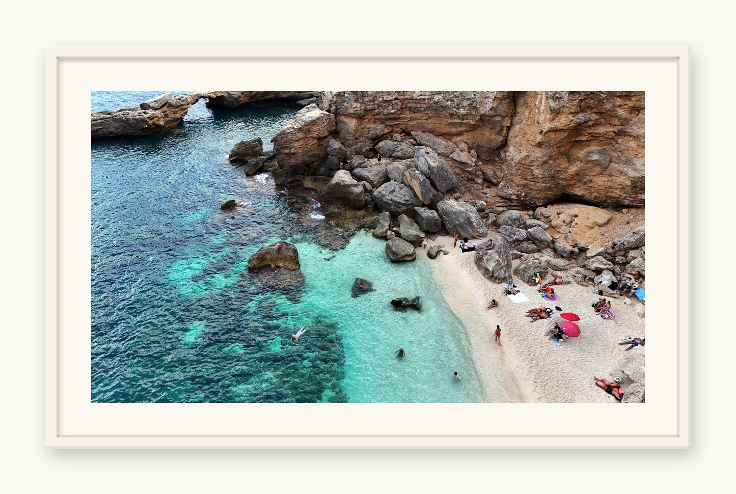 
                  
                    Turquoise Arch, Sardinia, framed in white with a 5 cm white border, shown at 66 x 87 cm
                  
                