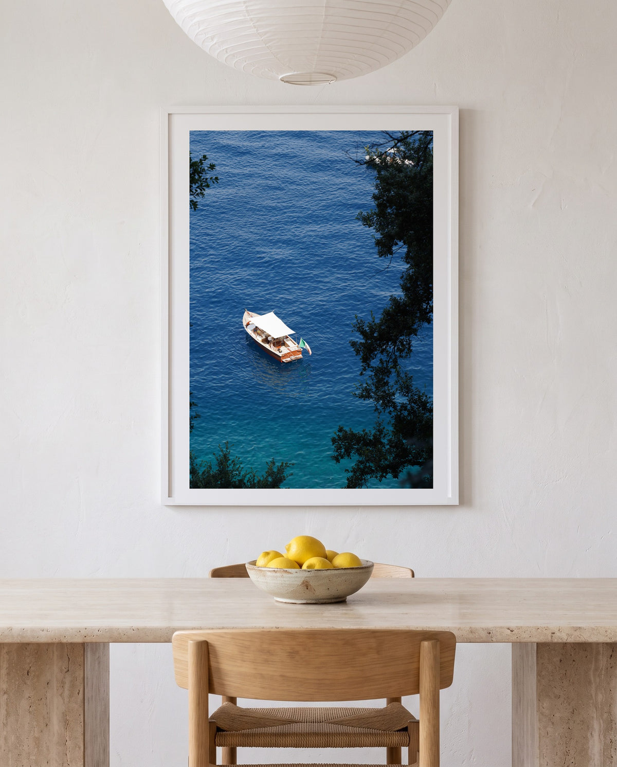 Dropping Anchor, framed above a travertine dining table (styled interior)
