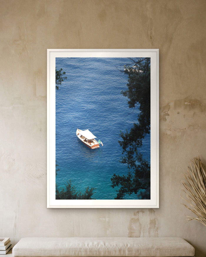 Dropping Anchor, framed on a textured plaster wall