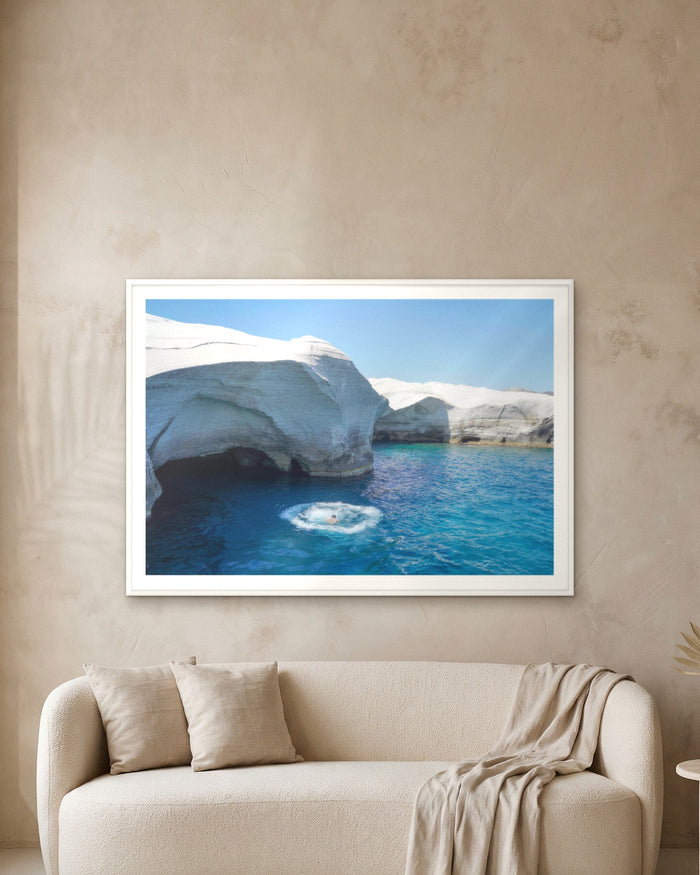Milos Beckons, framed on a textured plaster wall