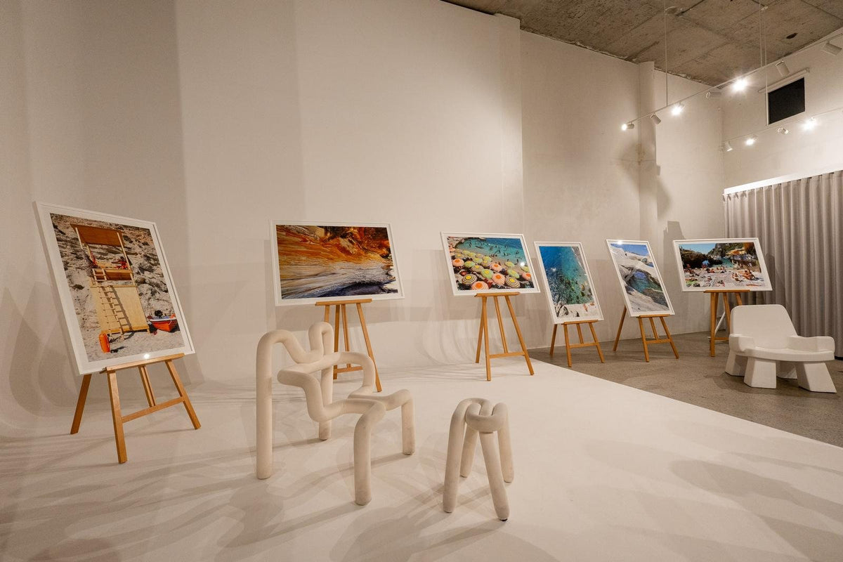 Contemplo prints on easels at the launch exhibition