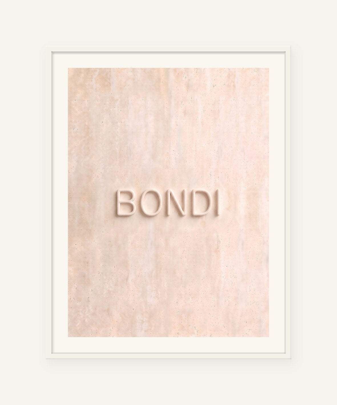 
                  
                    Bondi, the word carved into soft marble, framed in white with a 5 cm white border
                  
                
