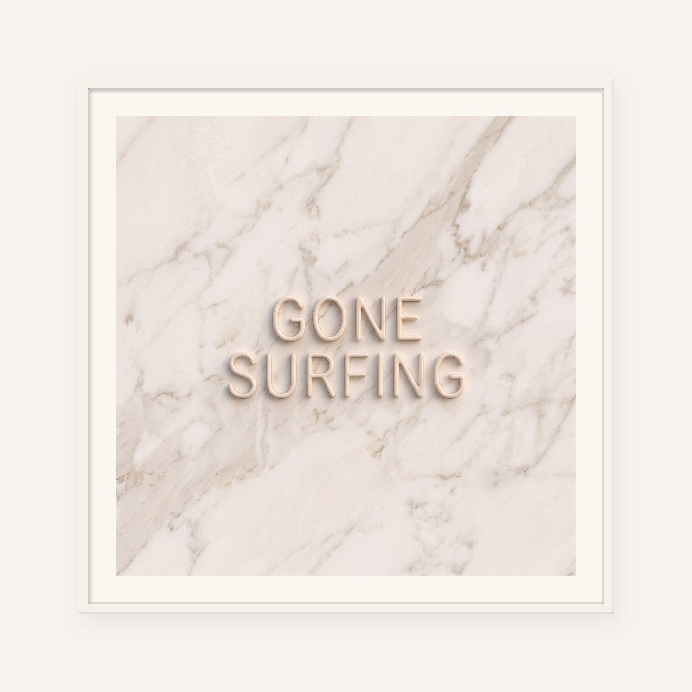 
                  
                    Gone Surfing, the word carved into soft marble, framed in white with a 5 cm white border
                  
                