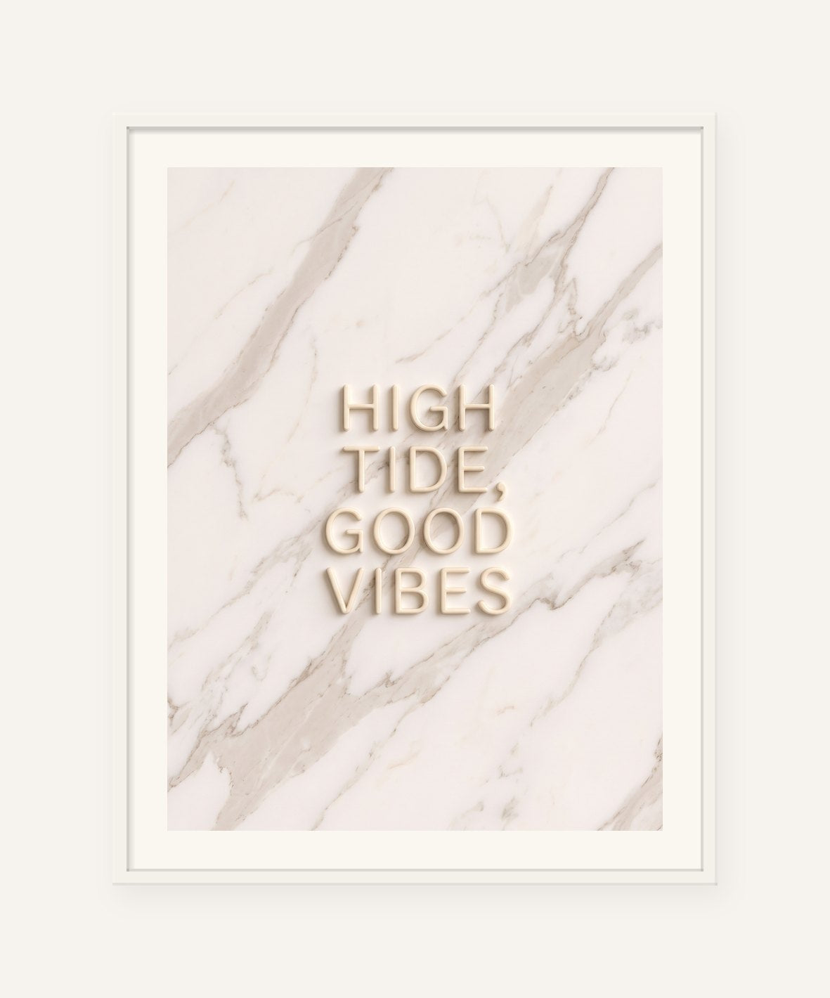 
                  
                    High Tide, Good Vibes, the word carved into soft marble, framed in white with a 5 cm white border
                  
                