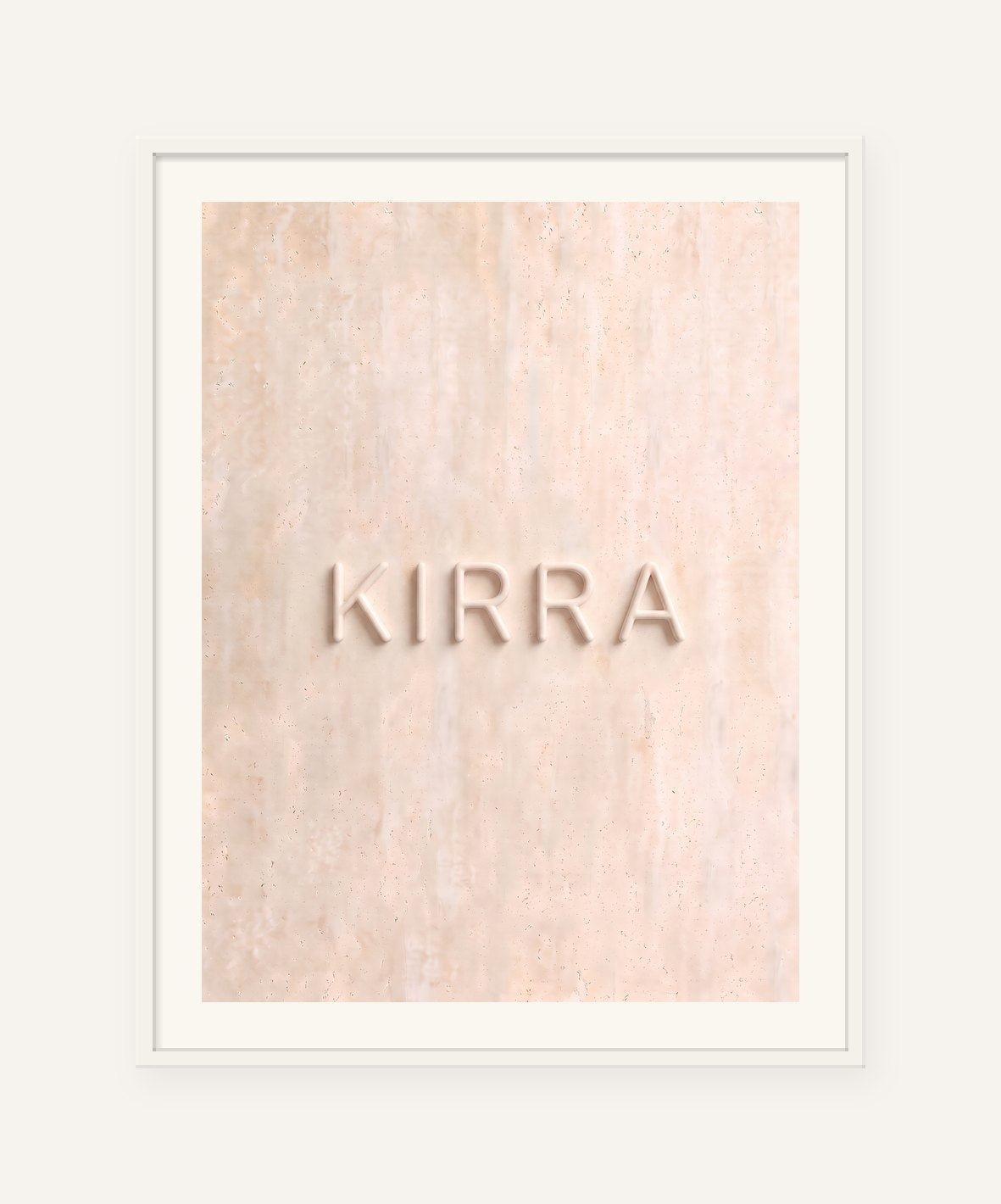 
                  
                    Kirra, the word carved into soft marble, framed in white with a 5 cm white border
                  
                