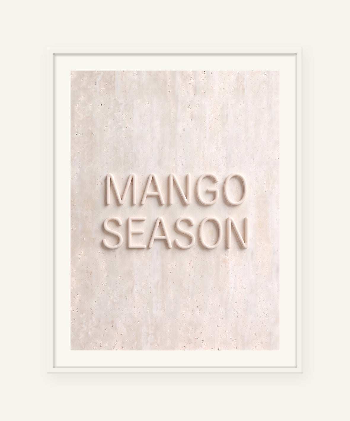 
                  
                    Mango Season, the word carved into soft marble, framed in white with a 5 cm white border
                  
                