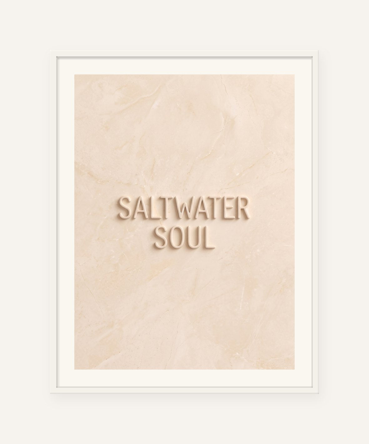 
                  
                    Saltwater Soul, the word carved into soft marble, framed in white with a 5 cm white border
                  
                