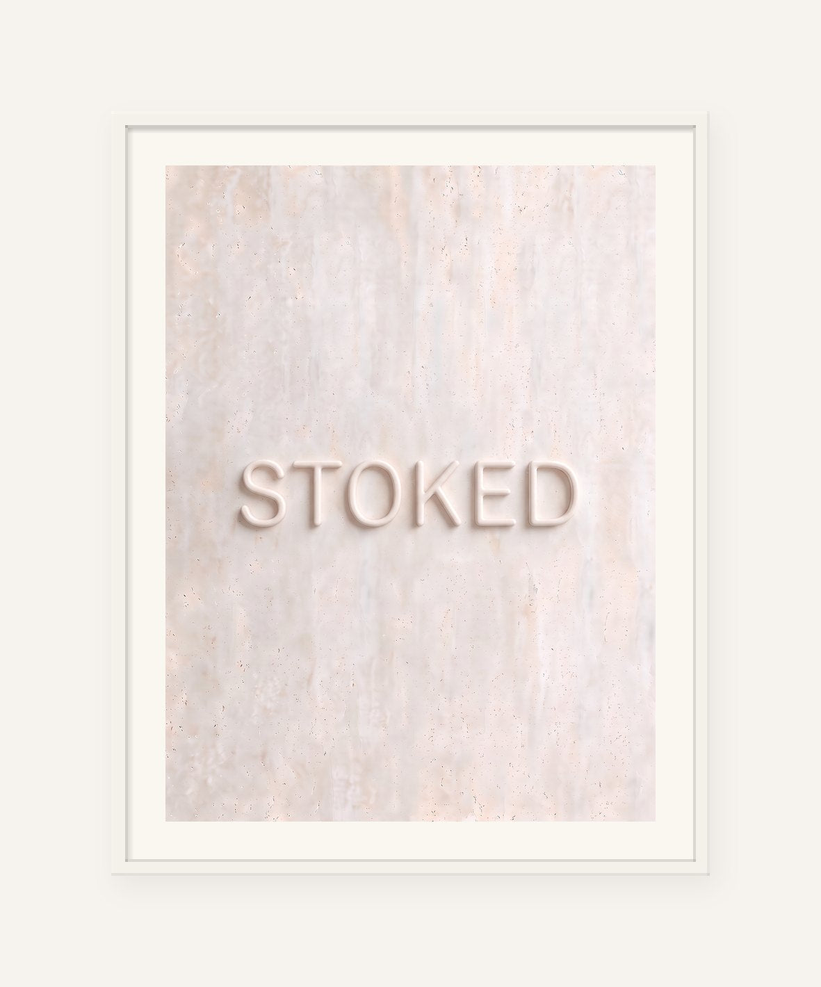 
                  
                    Stoked, the word carved into soft marble, framed in white with a 5 cm white border
                  
                