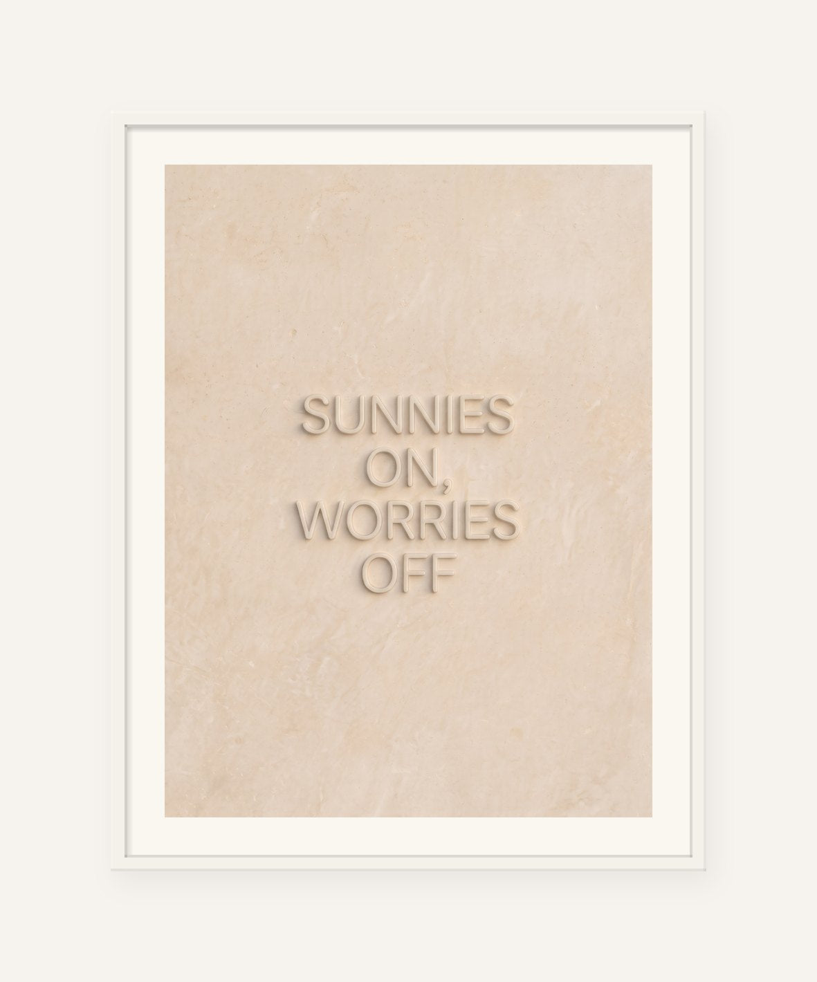 
                  
                    Sunnies On, Worries Off, the word carved into soft marble, framed in white with a 5 cm white border
                  
                